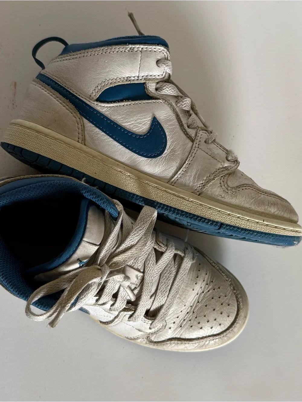 Air Jordan 1 Mid White and Navy Sneakers